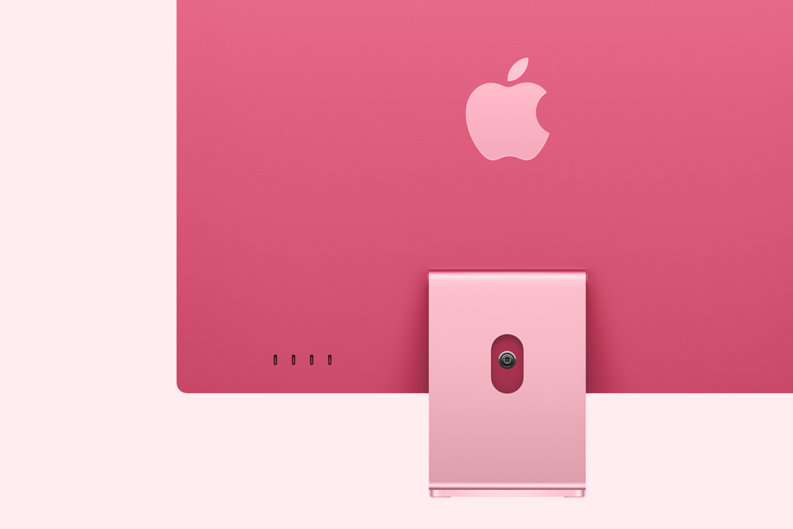 Vista posterior de una iMac rosa, que destaca los cuatro puertos USB-C